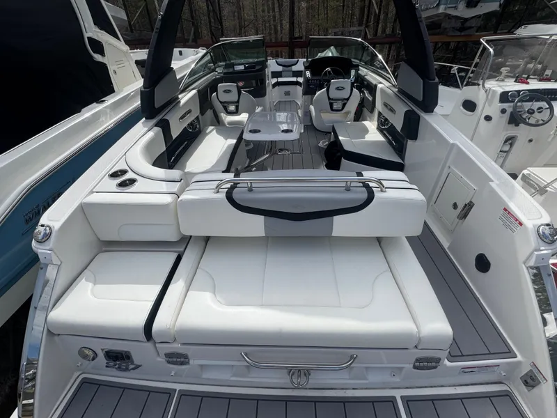 Slide: The Image of Interior of 2023 Chaparral 287 SSX boat with luxurious white seating. - 5