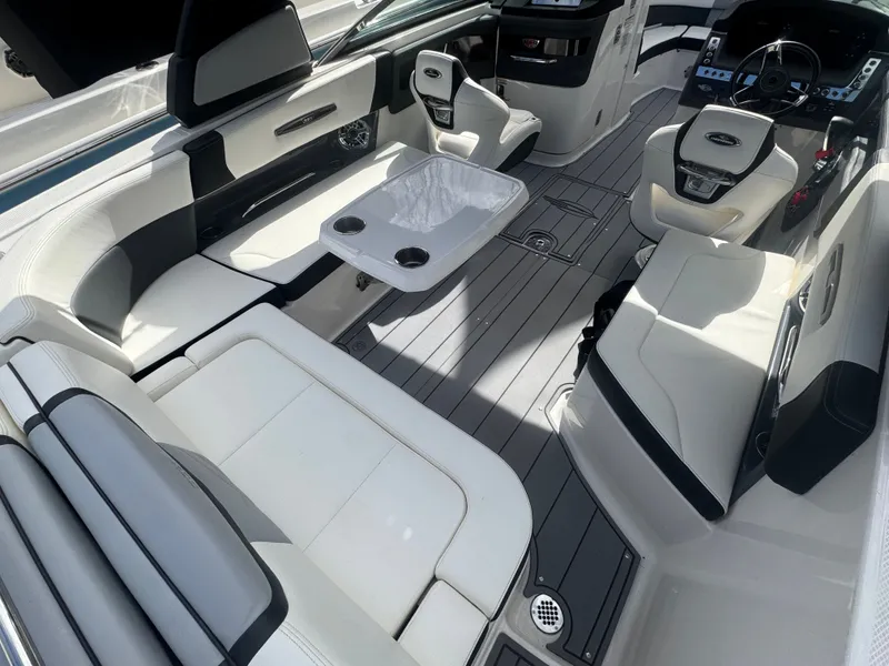 Slide: The Image of Interior of 2023 Chaparral 287 SSX with luxurious seating. - 7