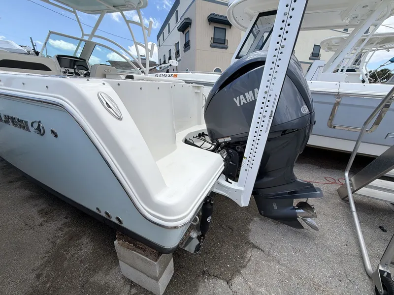 Slide: The Image of Sailfish 245 DC boat 2022 with Yamaha outboard motor. - 10