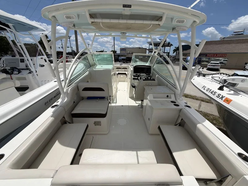 Slide: The Image of Interior view of a 2022 Sailfish 245 DC boat at the dock. - 13