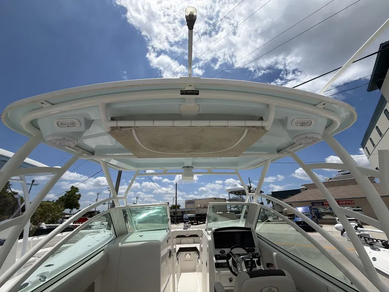 Slide: The Image of Sailfish 245 DC 2022 boat with hardtop and helm station. - 3