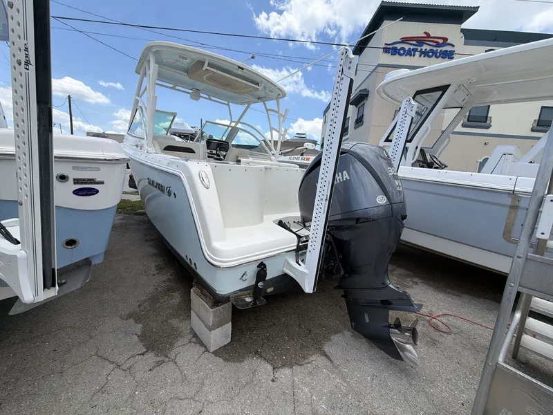 Slide: The Image of 2022 Sailfish 245 DC boat with Yamaha outboard motor. - 9