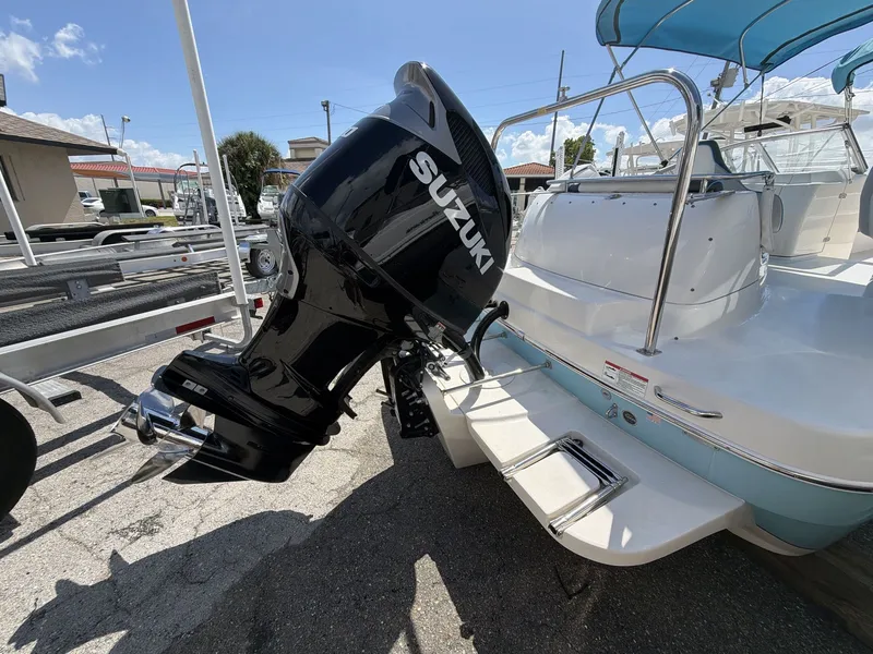 Slide: The Image of 2023 Splender 259 Sunstar boat with Suzuki outboard motor. - 8