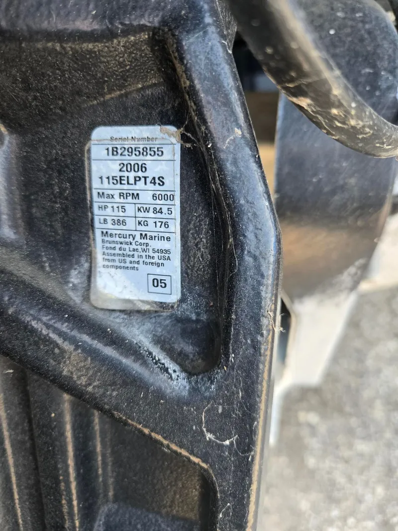 Slide: The Image of Label on a Mercury Marine engine, serial number 1B295855, year 2006. - 23