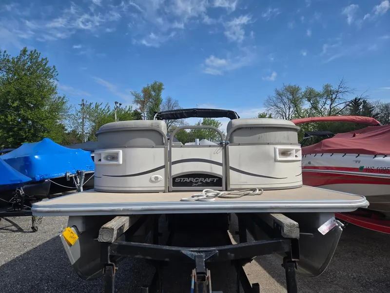 Slide: The Image of 2007 Starcraft Majestic 256 pontoon boat on a trailer. - 3
