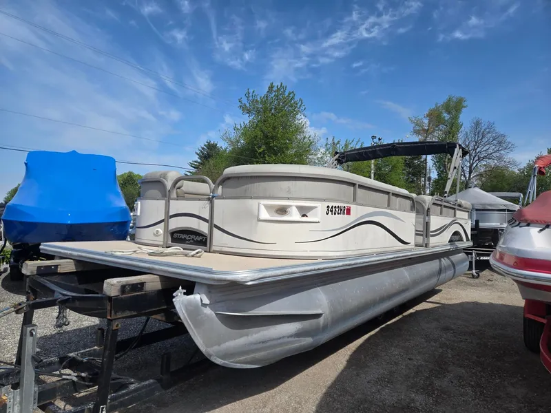 Slide: The Image of 2007 Starcraft Majestic 256 pontoon boat on trailer. - 4