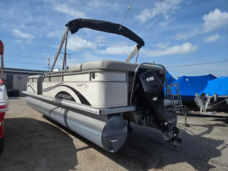 Slide: The Image of 2007 Starcraft Majestic 256 pontoon boat with outboard motor. - 7