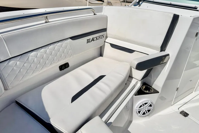 Slide: The Image of 2023 Blackfin 272 DC boat interior with luxurious seating and modern design. - 10
