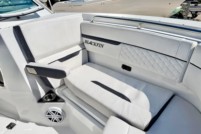 Slide: The Image of 2023 Blackfin 272 DC boat interior with luxurious seating and modern design. - 11