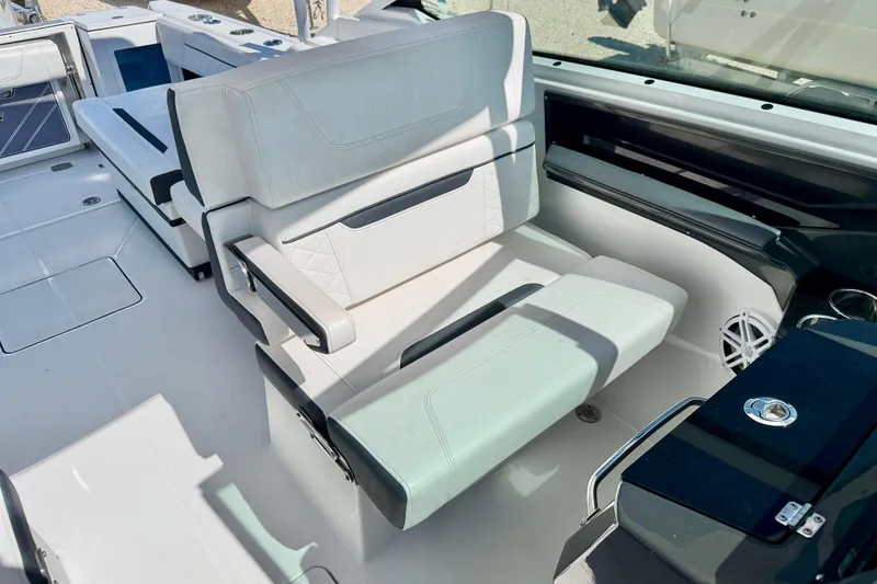 Slide: The Image of 2023 Blackfin 272 DC boat interior with luxurious seating and modern design. - 22