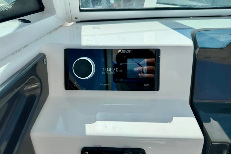 Slide: The Image of Fusion stereo display on 2023 Blackfin 272 DC boat dashboard. - 23