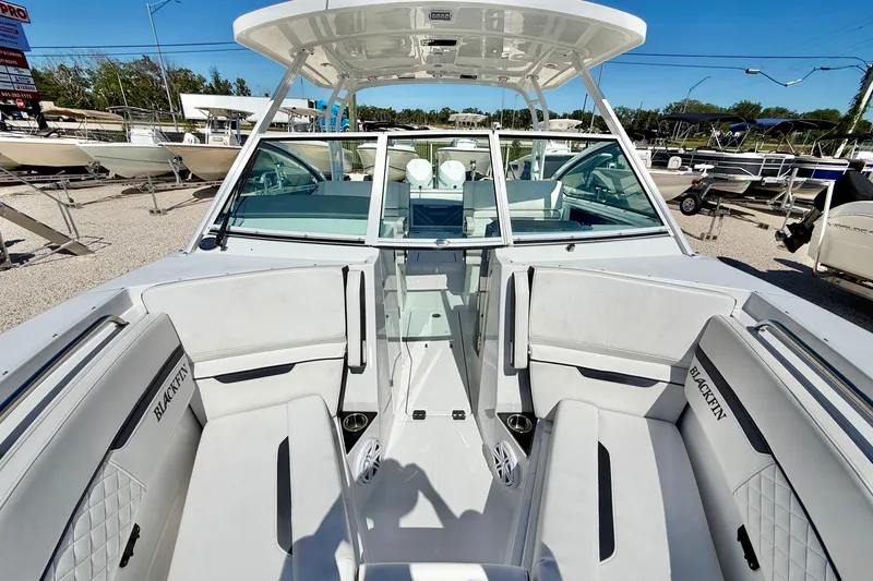 Slide: The Image of 2023 Blackfin 272 DC boat interior with spacious seating and modern design. - 42