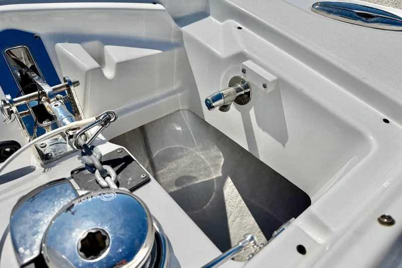 Slide: The Image of 2023 Blackfin 272 DC boat anchor compartment with chain and winch system. - 47