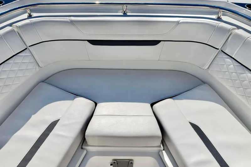Slide: The Image of Luxurious seating area on 2023 Blackfin 272 DC boat, featuring elegant white upholstery. - 9