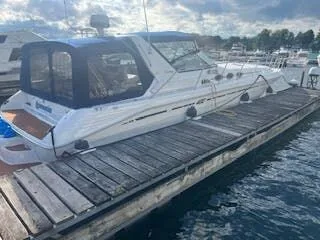 Slide: The Image of 1999 Sea Ray Sundancer docked on a sunny day. - 4