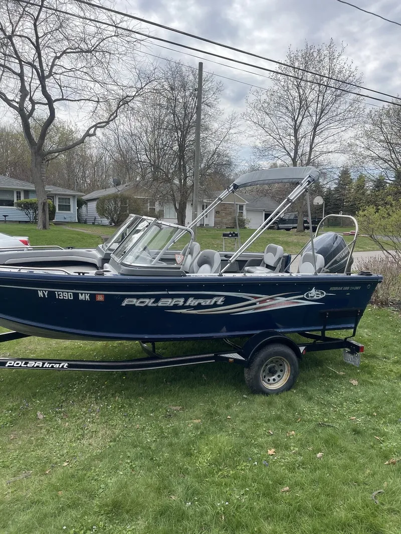 The Image of 2013 Polar Kraft Kodiak V 180 FS boat on trailer in yard. - 1