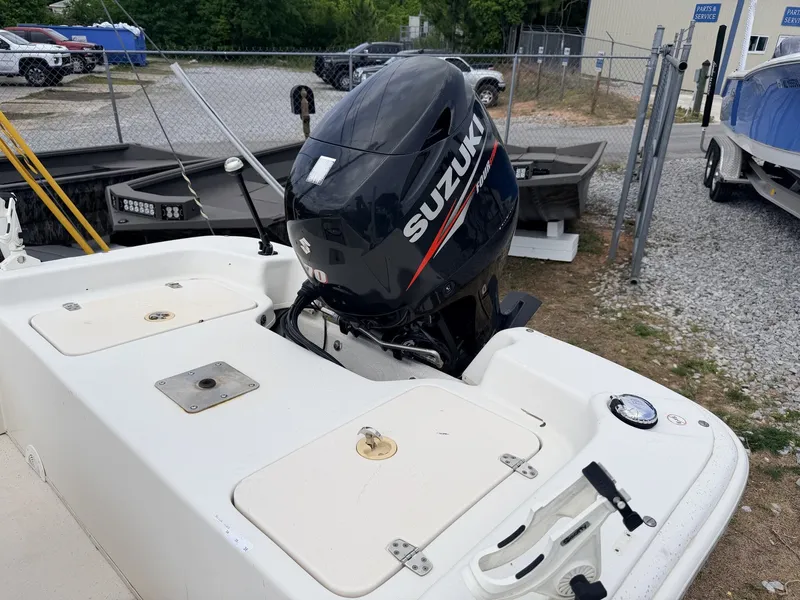 Slide: The Image of 2016 Carolina Skiff JVX18CC with Suzuki outboard motor. - 10