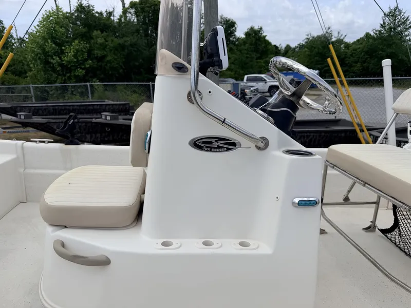 Slide: The Image of 2016 Carolina Skiff JVX18CC console with steering wheel and seat. - 6