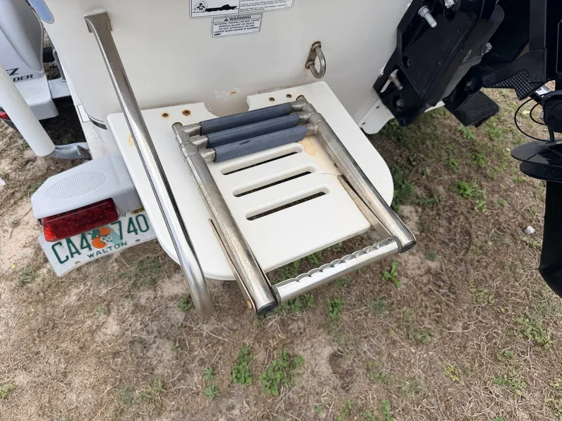 Slide: The Image of 2016 Carolina Skiff JVX18CC with retractable swim ladder. - 11