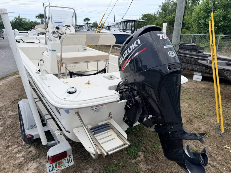 Slide: The Image of 2016 Carolina Skiff JVX18CC with Suzuki 70 HP outboard motor. - 12