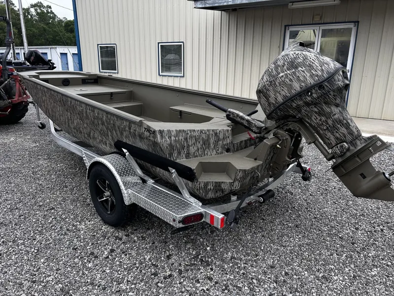 Slide: The Image of Thor Timber Hammer 60HP boat with camouflage design, year 2026. - 3