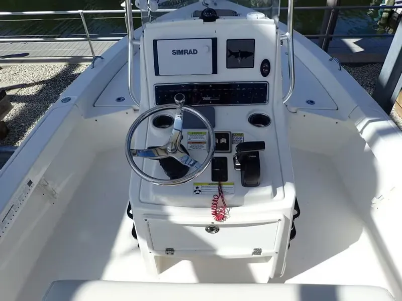 Slide: The Image of Helm console of a 2018 Pathfinder 2200 TRS boat with Simrad system. - 4