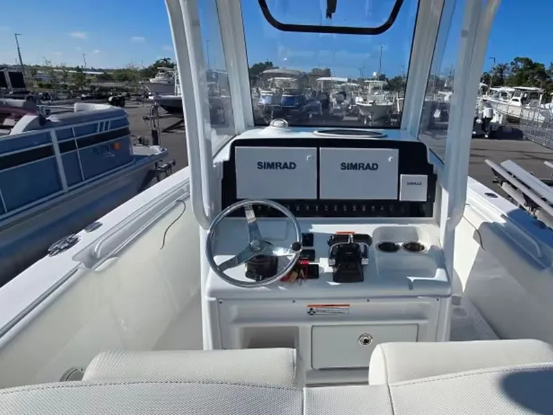 Slide: The Image of Interior view of a 2018 Sea Hunt Gamefish 27 boat with Simrad controls. - 11