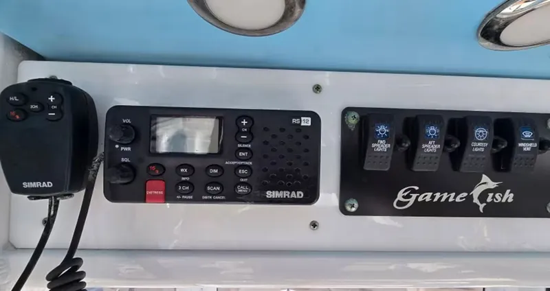 Slide: The Image of Simrad controls on Sea Hunt Gamefish 27, year 2018. - 12