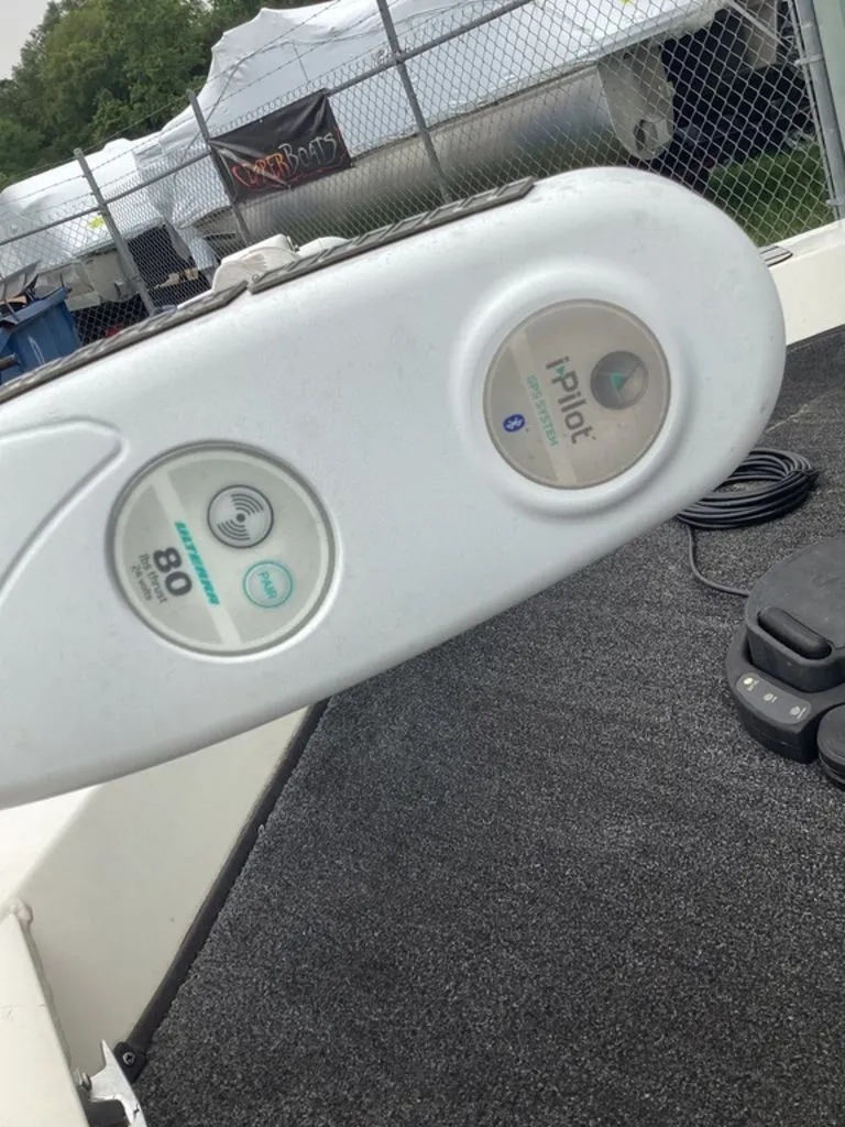 Slide: The Image of i-Pilot control on Lowe Stinger 18 HP boat, 2013 model. - 16