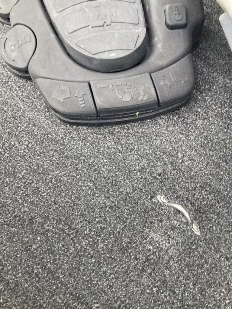 Slide: The Image of Lowe Stinger 18 HP 2013 boat pedal on carpeted floor. - 17