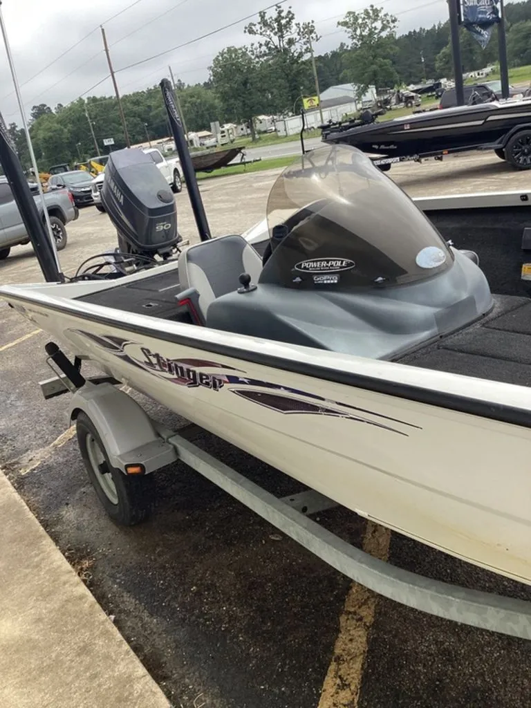 Slide: The Image of 2013 Lowe Stinger 18 HP boat on trailer, exterior view. - 20