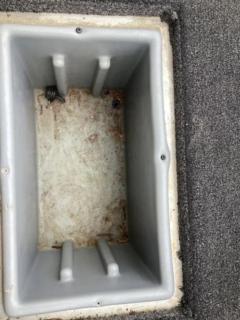 Slide: The Image of Empty storage compartment in 2013 Lowe Stinger 18 HP boat. - 21