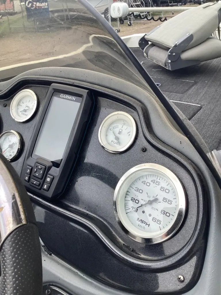 Slide: The Image of Dashboard of a 2013 Lowe Stinger 18 HP boat with Garmin GPS. - 25