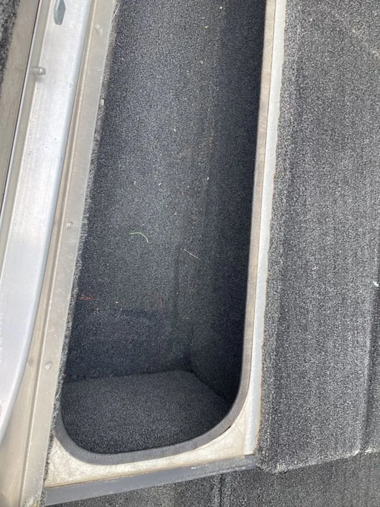Slide: The Image of Interior of a 2013 Lowe Stinger 18 HP boat. - 37