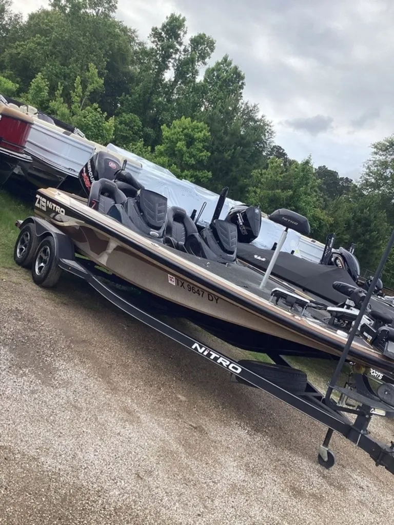 Slide: The Image of Rear view of a Nitro Z19 boat with 200 Pro outboard motor. - 2