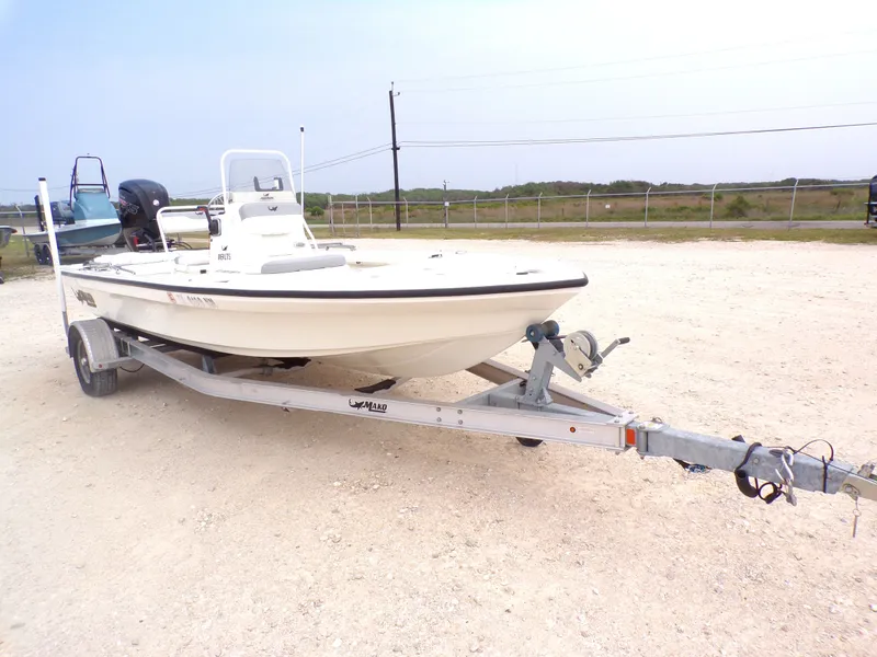 The Image of 2022 Mako 18 LTS boat on trailer, side view. - 1