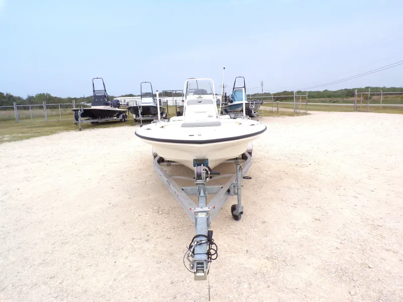 Slide: The Image of 2022 Mako 18 LTS boat on trailer in an outdoor lot. - 15