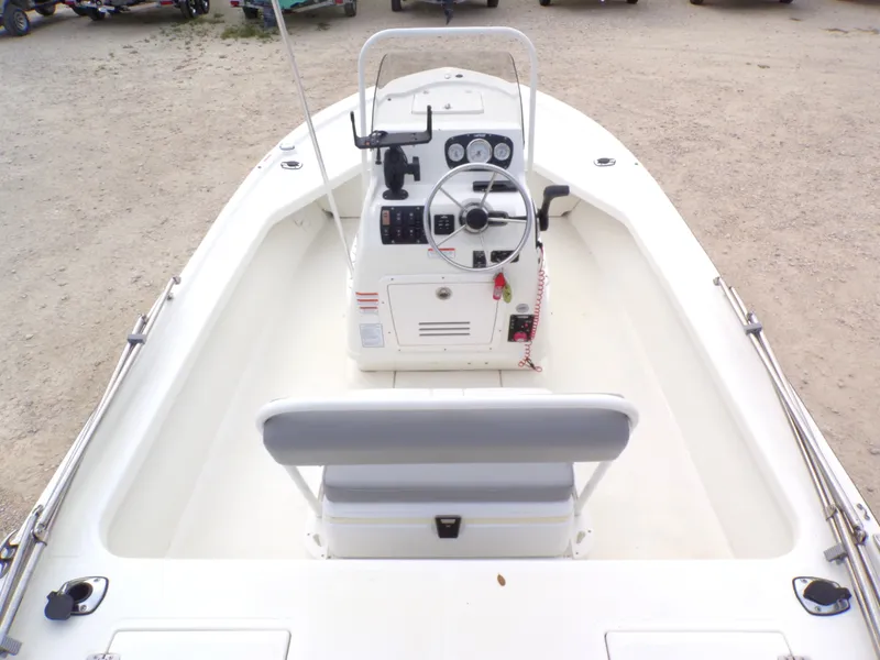 Slide: The Image of Interior view of a 2022 Mako 18 LTS boat with steering console. - 28