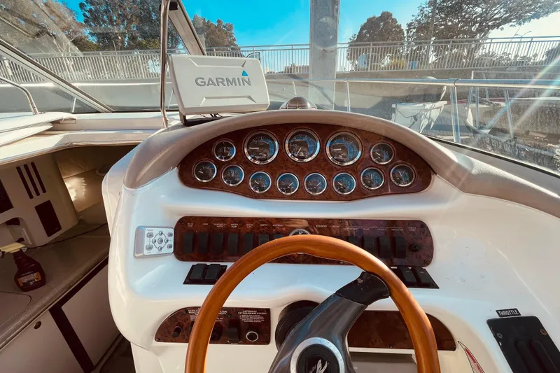 Slide: The Image of Cockpit of a 2001 Sea Ray 280 boat with Garmin navigation system. - 11