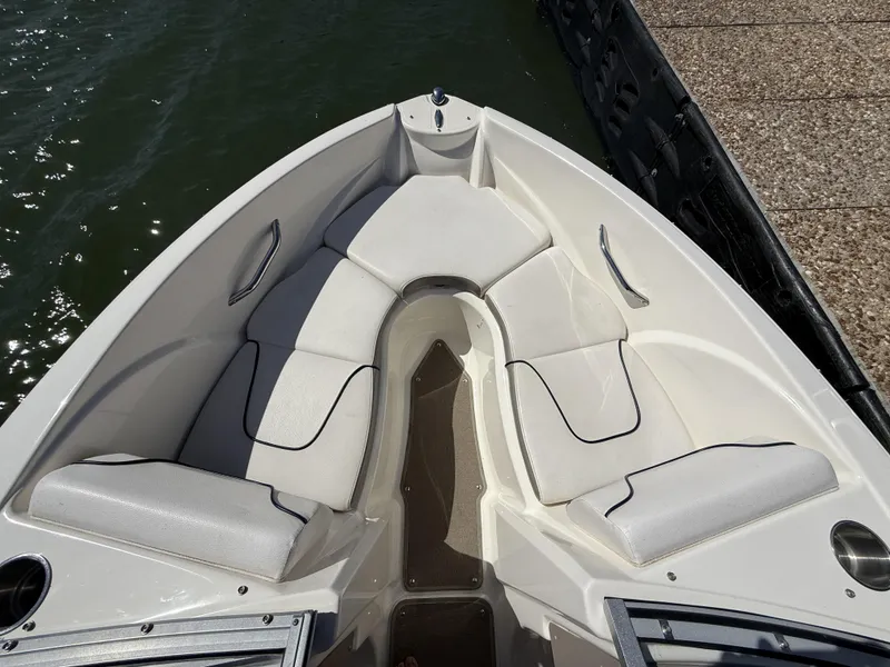 Slide: The Image of Interior view of 2011 Larson LX850 boat with seating area. - 4