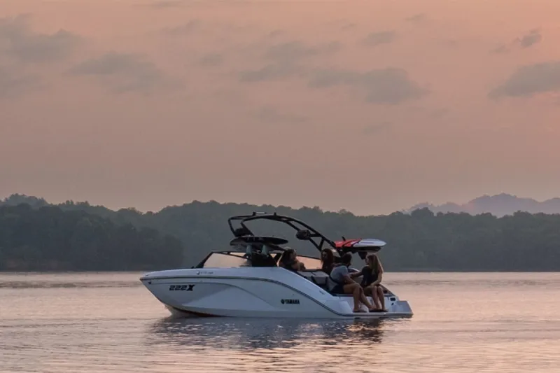 Slide: The Image of Yamaha 222XD boat 2026 at sunset on calm waters. - 11