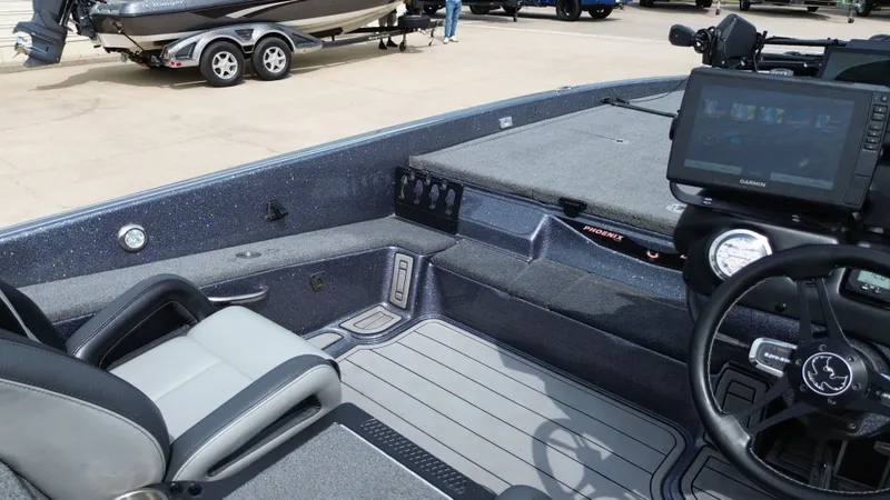 Slide: The Image of Interior of a 2021 Phoenix 921 Elite boat with modern features. - 36