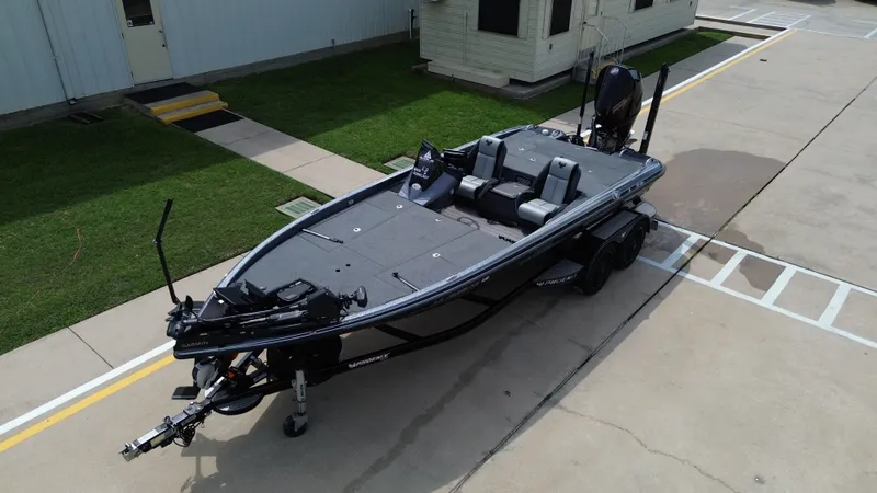 Slide: The Image of 2021 Phoenix 921 Elite boat on trailer, outdoor view. - 9
