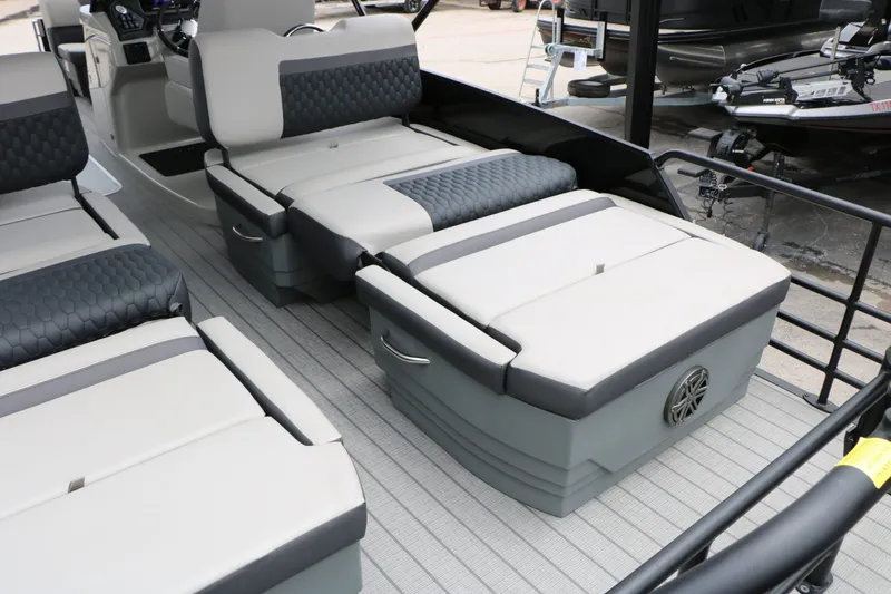 Slide: The Image of Interior of 2026 Sylvan L3 RLZ Tri Toon with luxurious seating. - 27