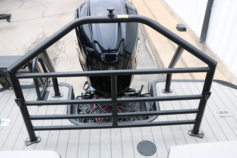 Slide: The Image of 2026 Sylvan L3 RLZ Tri Toon with outboard motor. - 29