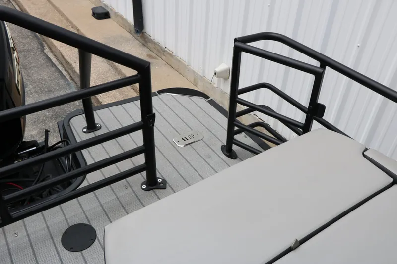 Slide: The Image of 2026 Sylvan L3 RLZ Tri Toon boat platform with railing. - 30