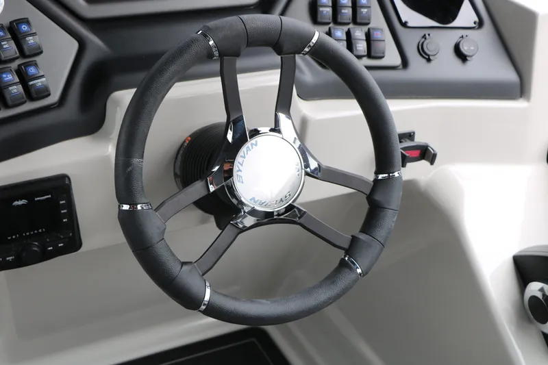 Slide: The Image of Steering wheel of Sylvan L3 RLZ Tri Toon 2026 boat. - 37