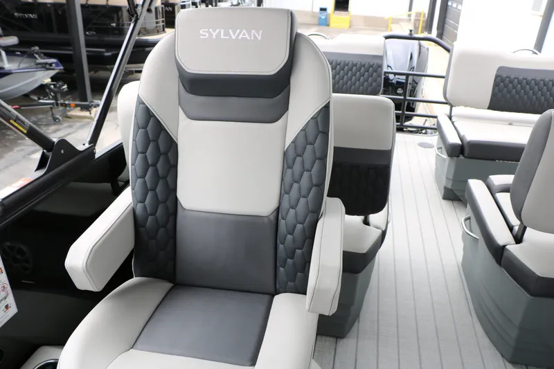 Slide: The Image of Interior of 2026 Sylvan L3 RLZ Tri Toon with luxurious seating. - 38
