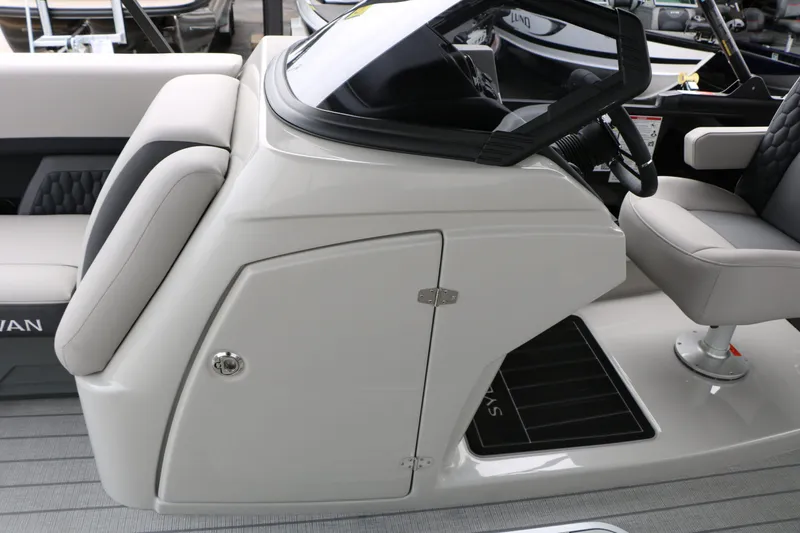 Slide: The Image of Interior of 2026 Sylvan L3 RLZ Tri Toon with helm console. - 42