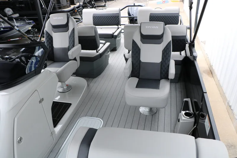 Slide: The Image of Interior of 2026 Sylvan L3 RLZ Tri Toon with luxurious seating. - 49